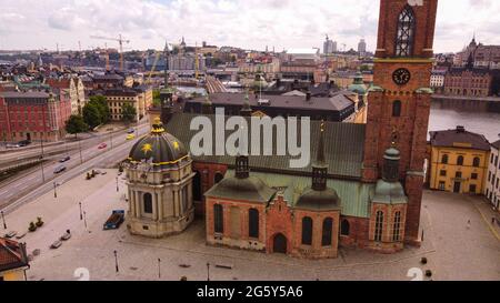 Riddarholmskyrkan church in front of Stockholm’s Gamla Stan (old town), a shot taken with a drone, Sweden Stock Photo