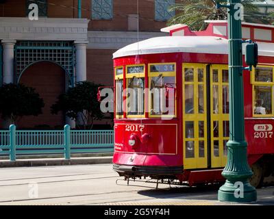 A Riverfront Line streetcar is stopped near the end of Canal Street. Stock Photo