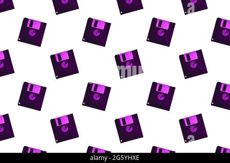 Purple floppy diskette on white background. Seamless pattern. Vintage and retro concept Stock Photo