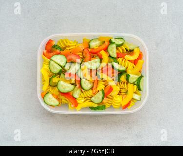 Vegetarian healthy cold pasta salad in lunch box Stock Photo
