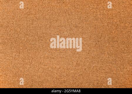 Orange fabric texture - close-up of a sofa upholstery Stock Photo