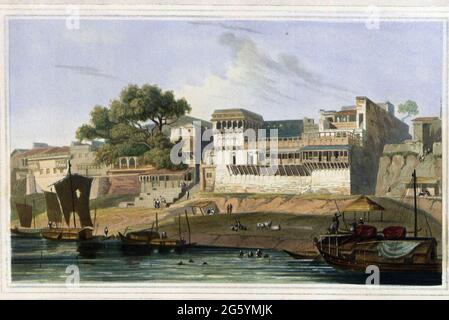 Part of the city of Patna, on the River Ganges, November 1795 The large and populous City of Patna is in the province of Bahar. The gauts, or steps leading up from the river, are very numerous here, and are intended for the advantage of merchandise, as well as the convenience of the Hindoos, whose religious duties oblige them frequently to perform ablutions in the sacred river Ganges. The larger building is the house of an Hindoo merchant, and is an example of the general style of buildings on the river side inhabited by men of that class. From the book ' Oriental scenery: one hundred and fift Stock Photo