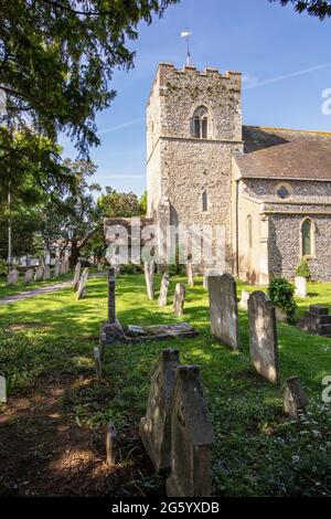 Church and graveyard of St Peter and St Paul, Rustington, West Sussex; the oldest part is the 12C tower Stock Photo