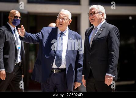 Jerusalem, Israel. 01st July, 2021. German President Frank-Walter Steinmeier (r) and Israeli President Reuven Rivlin walk through the garden of the President's official residence. The German President is in Israel for a three-day state visit. Credit: Kay Nietfeld/dpa/Alamy Live News Stock Photo