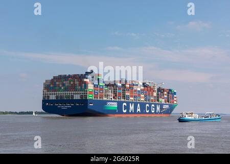 Stade, Germany - June 25, 2021: Rear view of container vessel  CMA CGM CONCORDE, one of nine sister ships and largest LNG powered ships of the world, Stock Photo