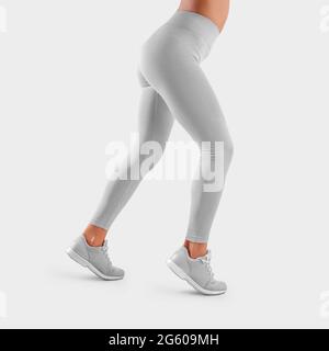 Young african american woman in white blank leggings and a crop top.  Mock-up Stock Photo - Alamy