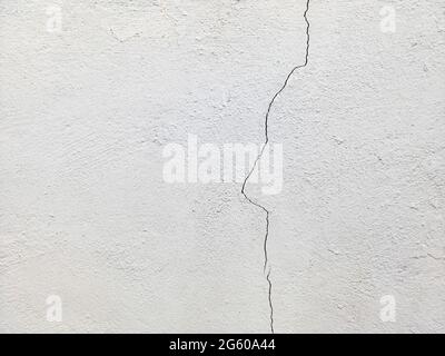 Close-up view of the cement crack wall texture background. Stock Photo