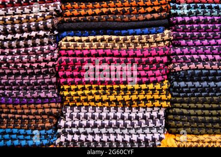 Folded colorful keffiyehs or kufiyas at middle eastern bazaar Stock Photo