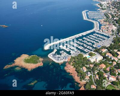 AERIAL VIEW. Santa-Lucia marina in the city of Saint-Raphaël. French Riviera, Var, France. Stock Photo