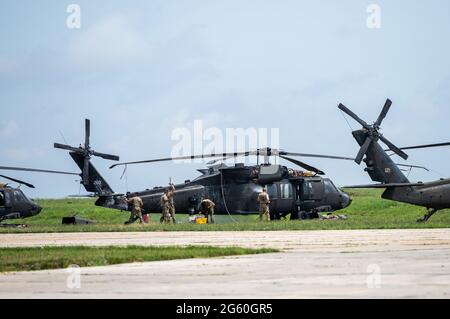 Mihail Kogalniceanu, Romania. 01st July, 2021. A US Army Sikorsky UH-60 Black Hawk is washed on the tarmac of a NATO airport in Romania. Credit: Christophe Gateau/dpa/Alamy Live News Stock Photo