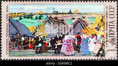USSR - CIRCA 1978: A stamp printed in USSR from the 'Birth Centenary of Boris M. Kustodiev ' issue shows Celebration in a Village, circa 1978. Stock Photo