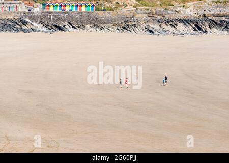 Due to the Covid-19 lockdown the beach at Barry Island is almost deserted despite it being a sunny spring bank holiday Stock Photo