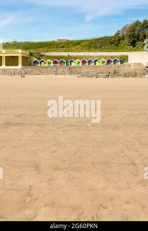 Due to the Covid-19 lockdown the beach at Barry Island is almost deserted despite it being a sunny spring bank holiday Stock Photo