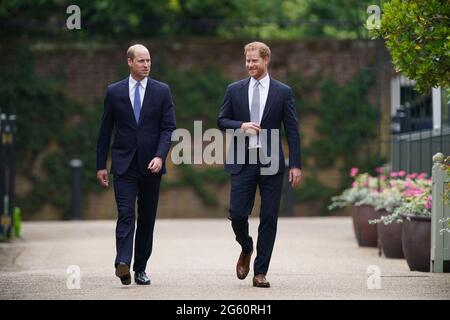 The Duke of Cambridge and Duke of Sussex arrive for the unveiling of a statue they commissioned of their mother Diana, Princess of Wales in the Sunken Garden at Kensington Palace, London, on what would have been her 60th birthday. Picture date: Thursday July 1, 2021. Stock Photo