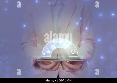 Lady In Uniform Holding Pen Phone With Futuristic Virtual Interface. Business Woman Using Pencil And Mobile Device Interacting With Holographic Stock Photo