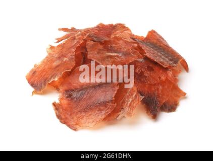 Pile od crispy dry smoked salmon chips isolated on white Stock Photo