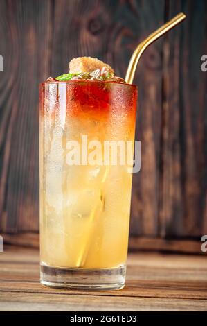 Glass of Holy water cocktail on the wooden background Stock Photo