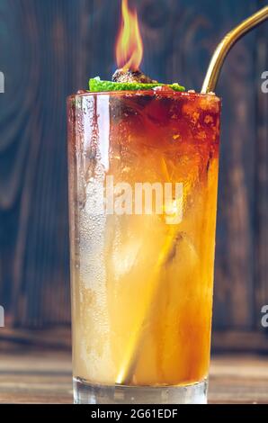 Glass of Holy water cocktail on the wooden background Stock Photo