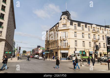 PUNTA ARENAS, CHILE - MARCH 4, 2015: People on a street in Punta Arenas, Chile.
