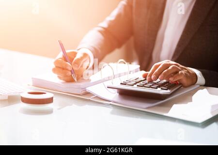 Accountant Working With Financial Data In The Office Stock Photo