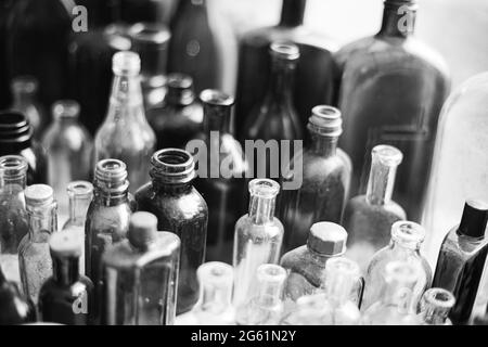 Many Old Deutsch Vintage Medical Glass Capacity. Detail Of Retro Chemical Pharmaceutical Science Researches. Small Bottles Different Sizes From Times Stock Photo