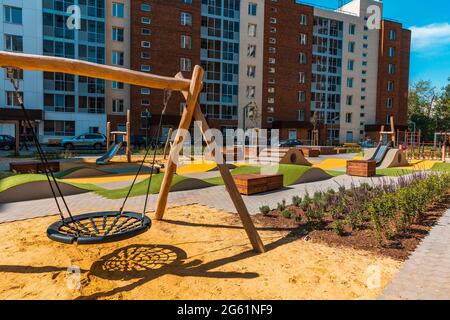 The courtyard of a modern residential building with equipments for workout and fitness outdoor activities. Stock Photo