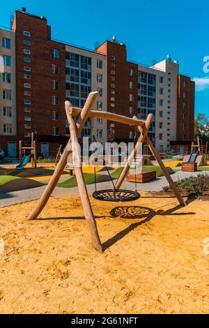 The courtyard of a modern residential building with equipments for workout and fitness outdoor activities. Stock Photo