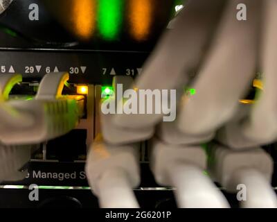 Network lights and cables in data center close-up view Stock Photo