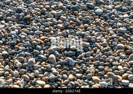 Close-up of smooth stones on a shingle beach, Beer Beach, Beer, Devon, UK Stock Photo