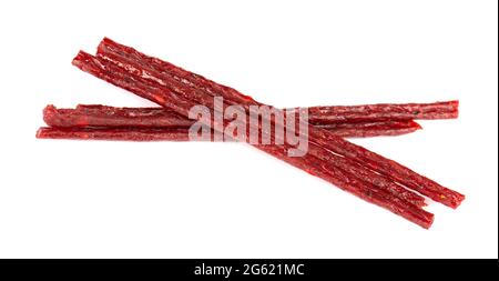 Dry salmon sticks isolated on white background. Dried fish snacks for beer. Stock Photo