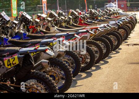 Omsk, Russia. 01 July, 2021. Motorcycles of the Silk Way Rally participants are built into the line in the participants parking, Credit: Igor Kutnii/A Stock Photo