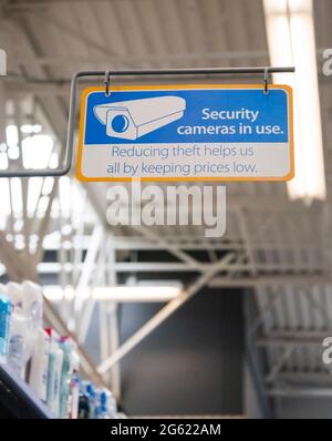 Camera Retail Warning Security Camera warning sign inside a department store to help prevent ...