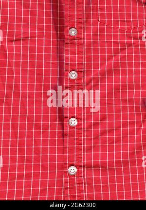 Multi colored classic plaid fabric, shirt pocket and button detail, checked shirt detail Stock Photo