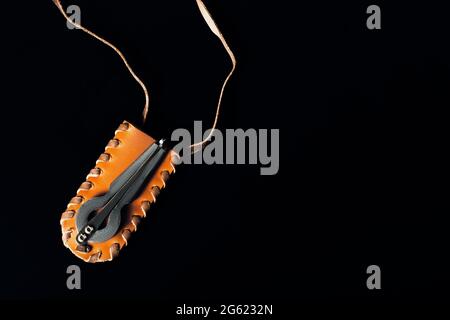 The harp compass lies on a leather case. Top view. A place to copy. Stock Photo
