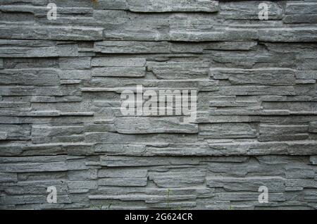 Background texture of modern gray concrete wall made of blocks Stock Photo