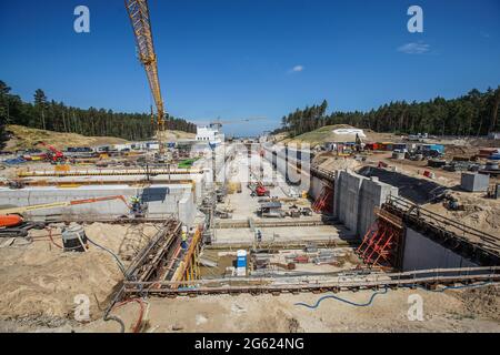 Nowy Swiat, Poland. 1st June, 2021. The construction site of a waterway connecting the Vistula Lagoon with the Gulf of Gdansk (Przekop Mierzei Wislanej) is seen in Nowy Swiat, Vistula Spit, Poland on 1 July 2021 Controversial The Vistula Spit canal is curently under construction canal across the Polish section of the Vistula Spit that will create a second connection between the Vistula Lagoon and Gdansk Bay (Baltic Sea) (Photo by Vadim Pacajev/Sipa USA) Credit: Sipa USA/Alamy Live News Stock Photo