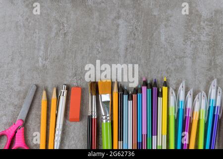 Table of flat lay on various school art supplies group student material Stock Photo