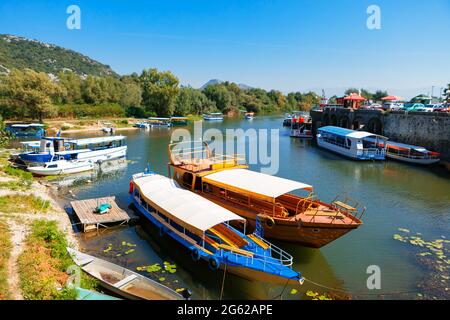 Harbor in Virpazar Montenegro . Boats for Skadar Lake Cruise Stock Photo