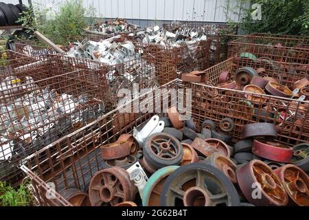 Scrap Surplus Bins of surplus scrap sit outside of Delaney's Surplus sales south of ...