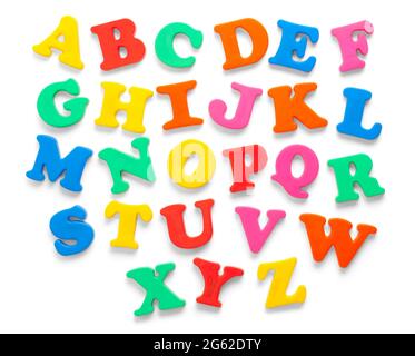 Alphabet Fridge Magnets Cut Out on White. Stock Photo