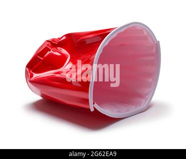 Broken Red Plastic Cup Cut Out on White. Stock Photo