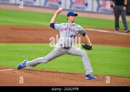 Atlanta, GA, USA. 01st July, 2021. New York Mets pitcher Jacob deGrom delivers a pitch during the third inning of a MLB game against the Atlanta Braves at Truist Park in Atlanta, GA. Austin McAfee/CSM/Alamy Live News Stock Photo