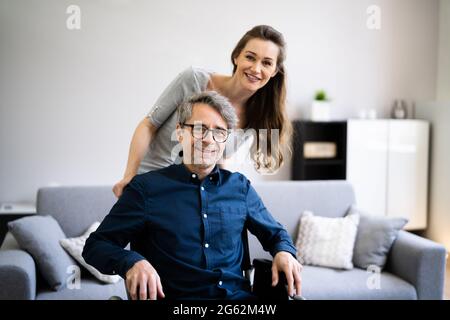 Smiling Older Man Care By Medical Nurse Stock Photo