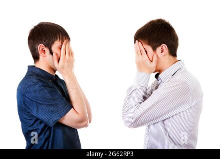 Side View of the Two Guys close the Faces on the White Background Stock Photo