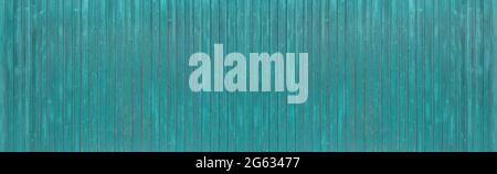 Turquoise blue painted, slightly weathered panoramic wooden wall Stock Photo