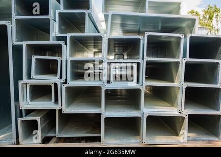 Ventilation pipes are square and rectangular. Steel pipes, parts for the construction of air ducts for an industrial air conditioning system in a Stock Photo