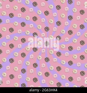 Creative pattern of colorful donuts on pastel pink background. Contemporary art, flat lay design Stock Photo