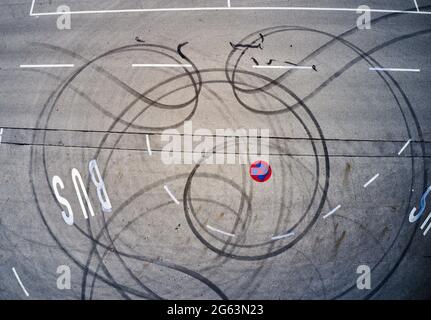 Marktoberdorf, Germany. 02nd July, 2021. Marks on asphalt from spinning tires during a burnout on July 02, 2021 in Marktoberdorf, Germany. Photographer Credit: Peter Schatz/Alamy Live News
