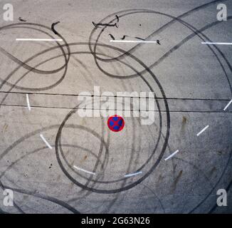 Marktoberdorf, Germany. 02nd July, 2021. Marks on asphalt from spinning tires during a burnout on July 02, 2021 in Marktoberdorf, Germany. Photographer Credit: Peter Schatz/Alamy Live News