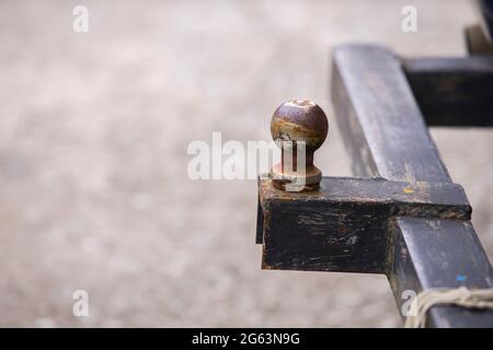 Old 2" trailer ball hitch mounted on the back of a vehicle. Stock Photo